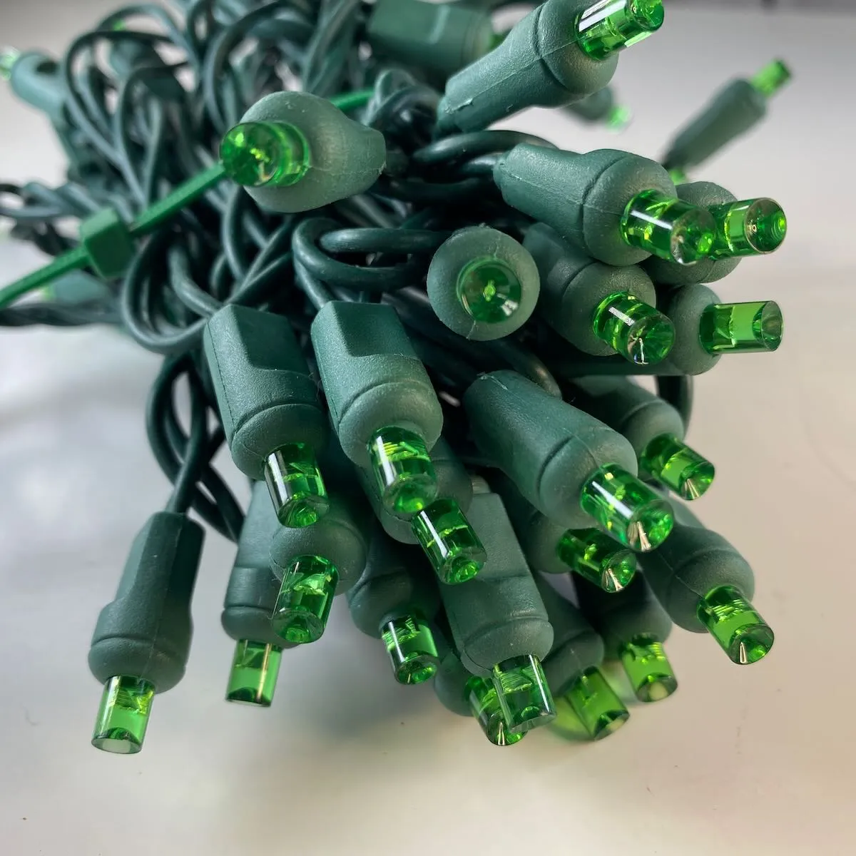 50-light  5mm Green LED Christmas Lights, 4" Spacing, Green Wire