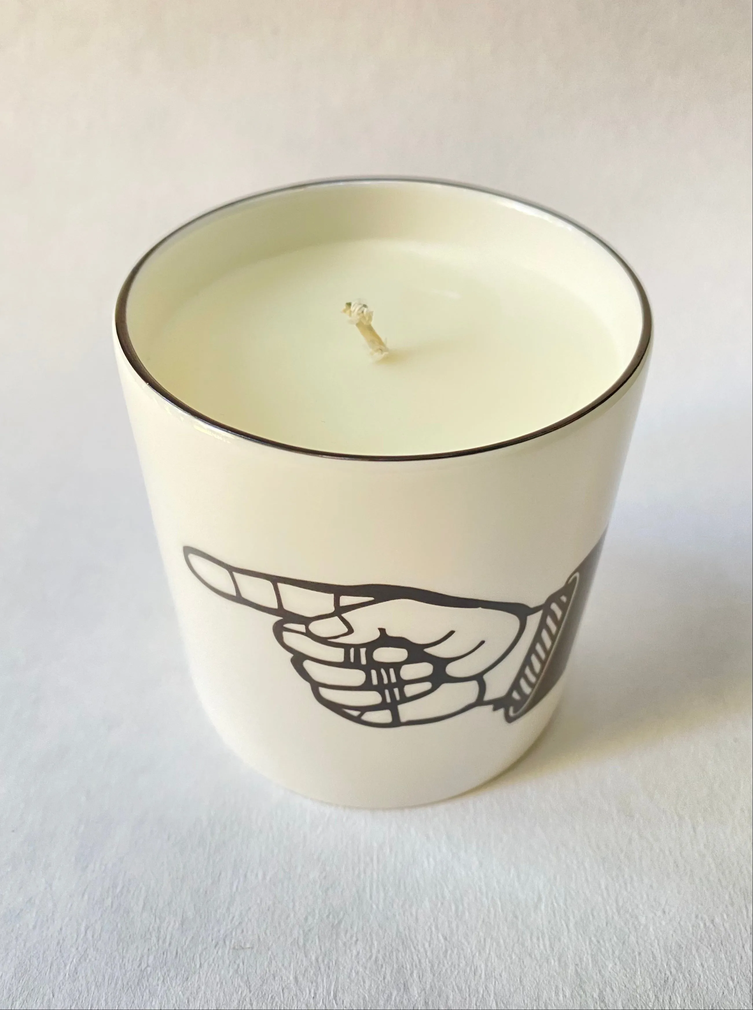 Pointing Hand Candle